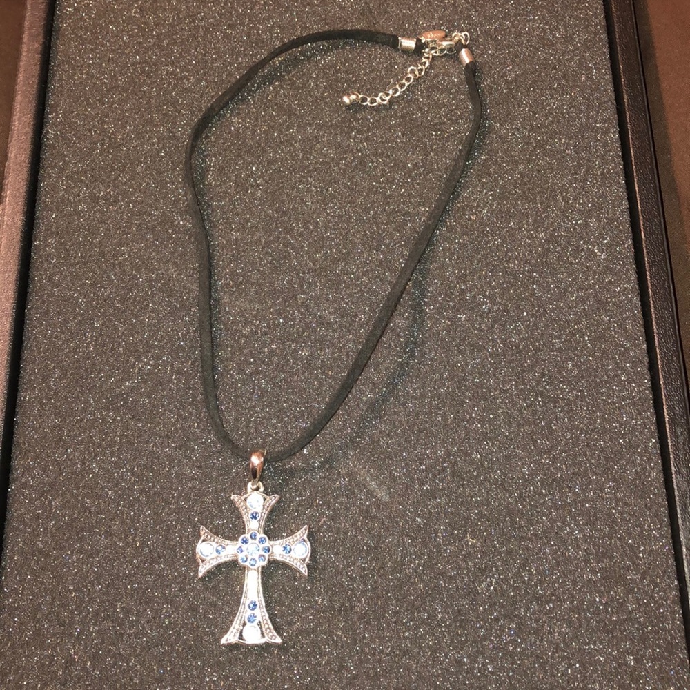 Blue stone cross necklace.